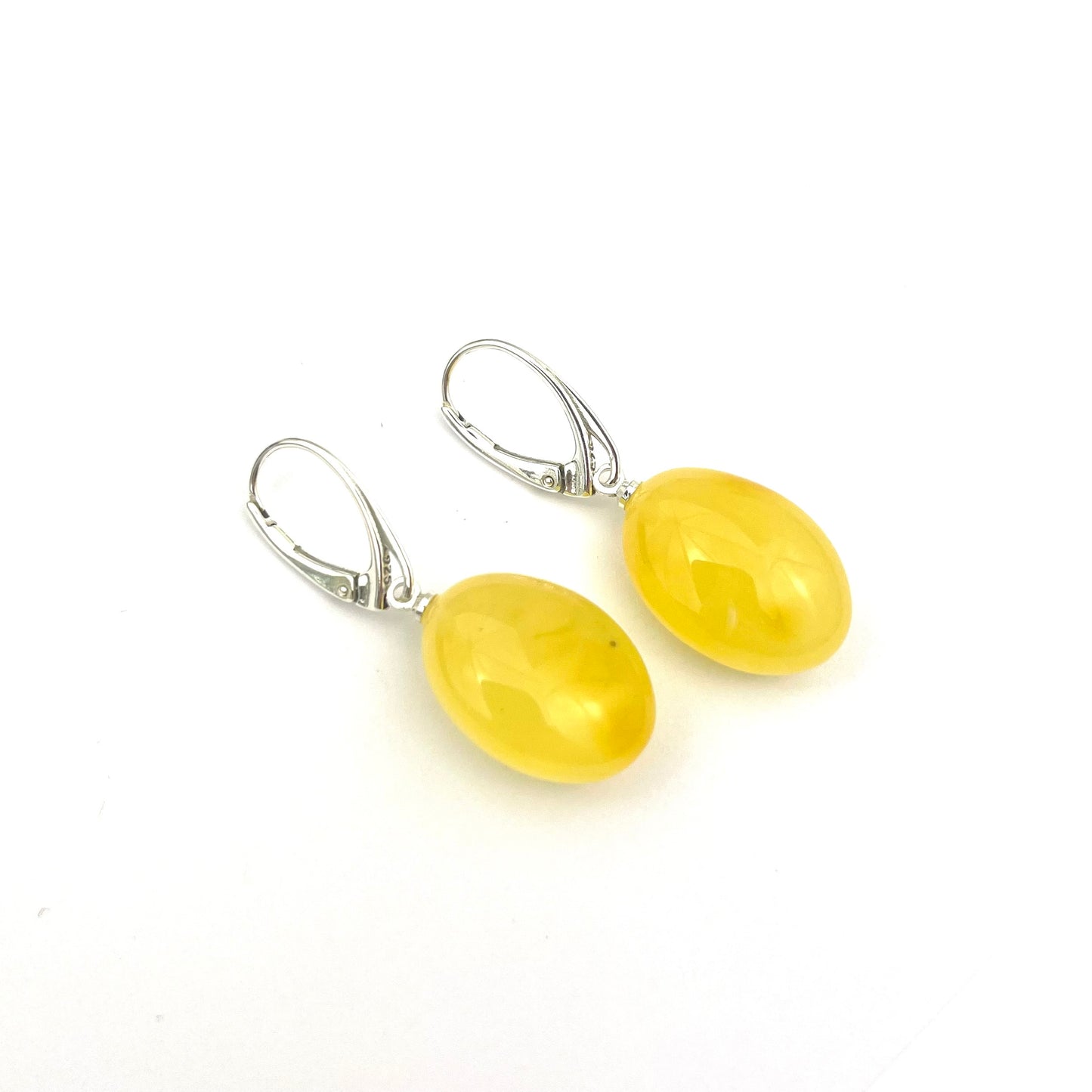 Polished Amber Bean Shape Butter Color Silver Earrings