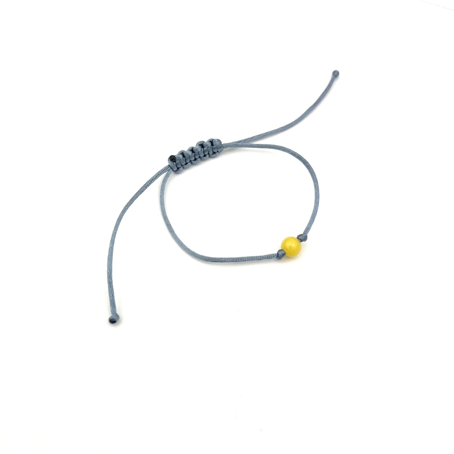 Polished Blue Adjustable Bracelet with Amber Bead