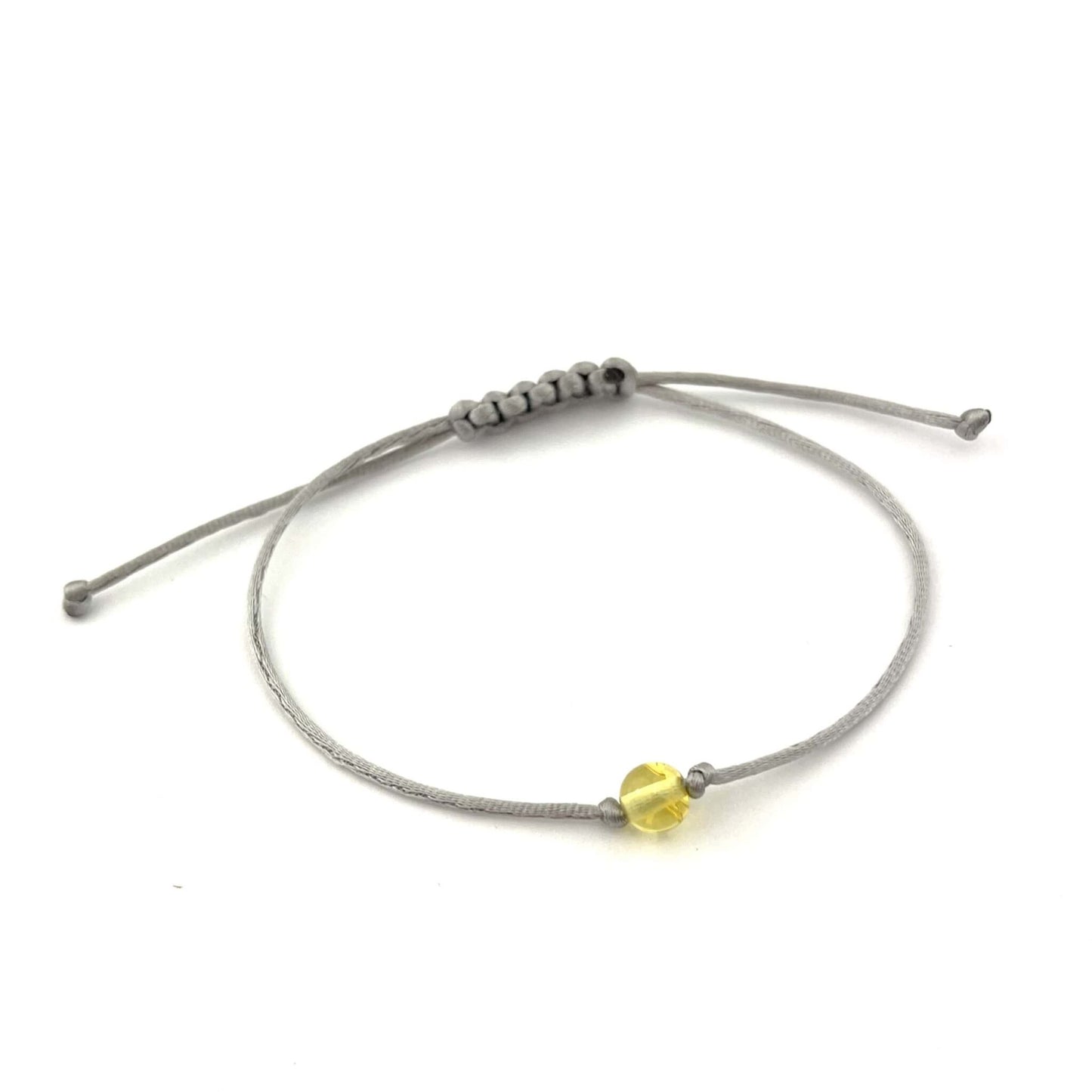 Polished Grey Adjustable Bracelet with Amber Bead