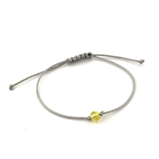 Polished Grey Adjustable Bracelet with Amber Bead