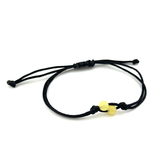 Polished Black Adjustable Bracelet with Two Amber Beads