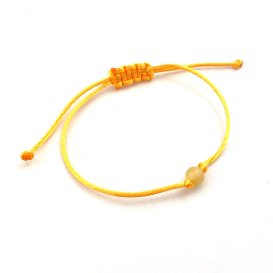 Polished Orange Adjustable Bracelet with Amber Bead