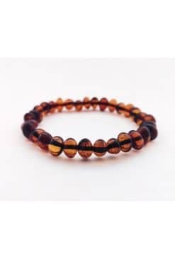 Polished adult rounded beads cognac color bracelet