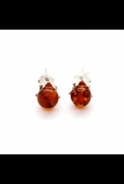Polished small stud rounded cognac color earrings