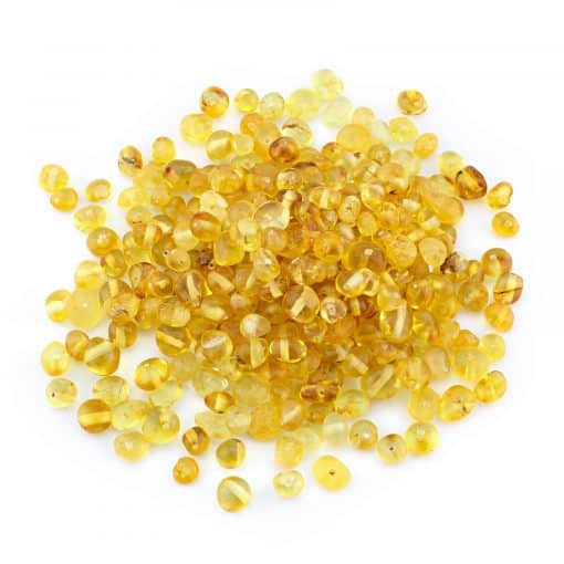 Loose polished semi rounded lemon color beads 100g