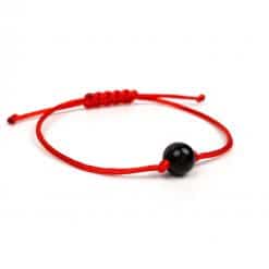 Polished Adjustable bracelet with a black bead
