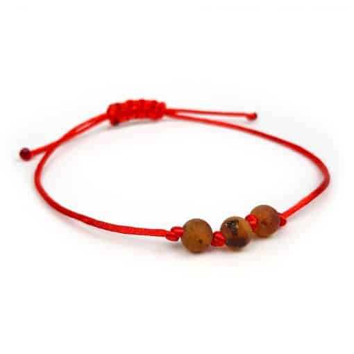 Raw Adjustable bracelet with three cognac beads