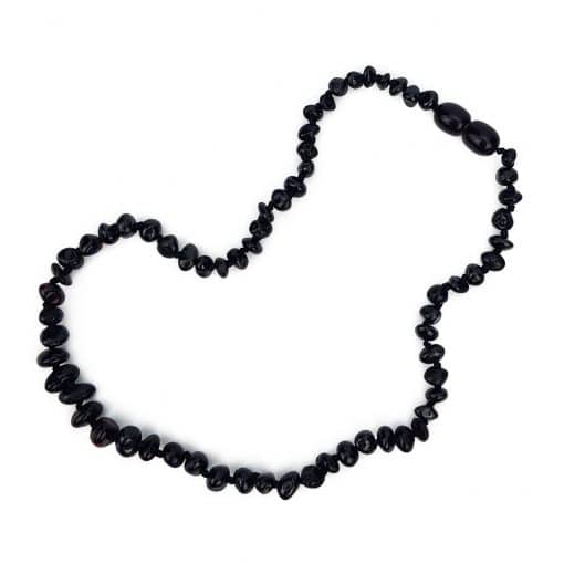 Polished teenage semi rounded black color necklace