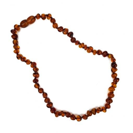 Polished teenage semi rounded cognac color necklace